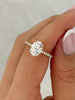 Paige – Oval Solitaire with Hidden Halo and Pavé Lifestyle Image