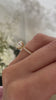 Paige – Oval Solitaire with Hidden Halo and Pavé Lifestyle Image