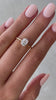 Emily - Oval Solitaire with Tapered Band Lifestyle Image