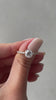 Claudia – Cushion Solitaire with Hidden Halo and Pavé Lifestyle Image