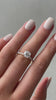 Claudia – Cushion Solitaire with Hidden Halo and Pavé Lifestyle Image