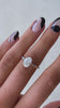 Scarlett - Oval Cathedral Solitaire with Hidden Halo Lifestyle Image