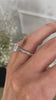 Melinda - 4 Claw Knife Edge Round Solitaire with Hidden Halo and Pavé Lifestyle Image