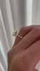 Jacinta - Pear Solitaire with Accent Band Lifestyle Image