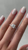 Annie – Princess Solitaire with Hidden Halo and Pavé Lifestyle Image