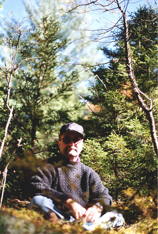 Curtis Lang Meditating Under Balsam Tree, Mt. Tremper, New York, 1994, photo by Jane Sherry