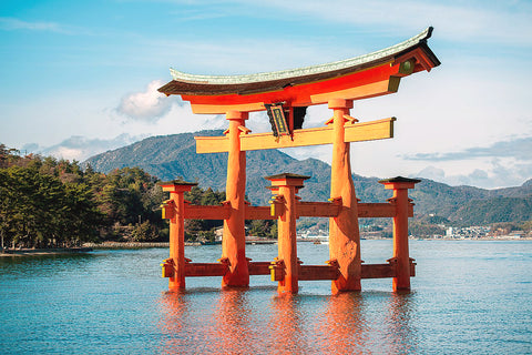 The torii gate at Itsukushima Shinto Shrine on the island of Itsukushima (popularly known as Miyajima) in Hiroshima Prefecture, Japan