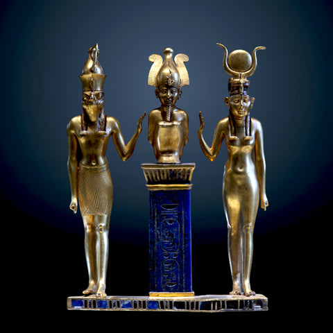 The family of Osiris. Osiris on a lapis lazuli pillar in the middle, flanked by Horus on the left and Isis on the right (22nd dynasty, Louvre, Paris)  Louvre Museum / CC BY-SA 2.0 FR 