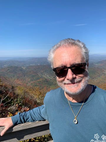 Curtis atop Flat Top Mountain Lookout Tower, Blowing Rock, North Carolina, photo by Jane Sherry