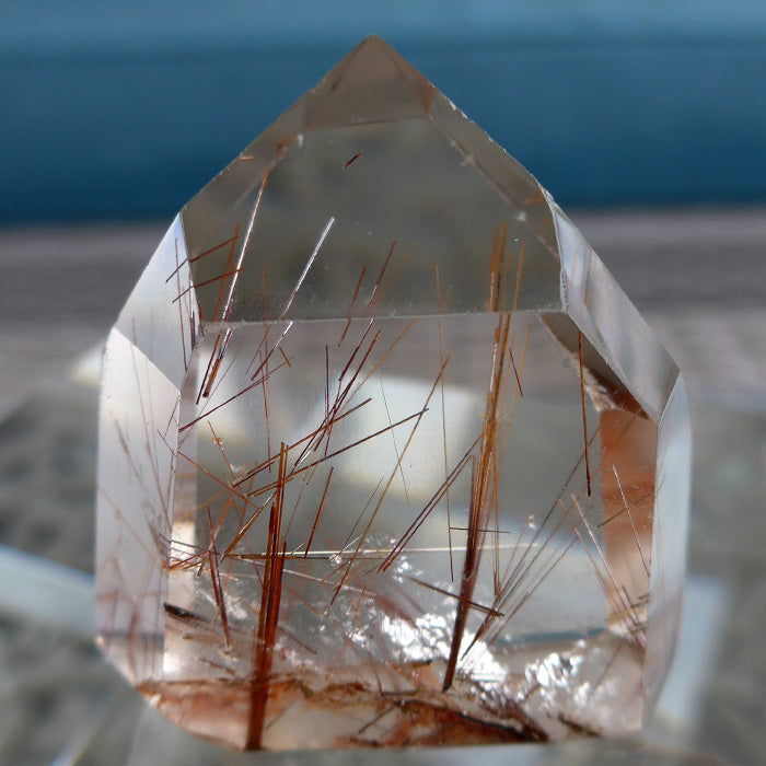 Short Polished Orange Rutile Isis Generator