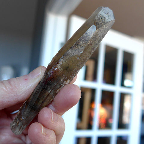 Unpolished Shadow Lemurian Wand with Anatase, courtesy Satya Center