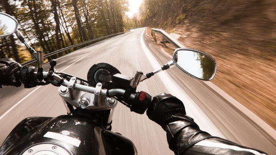 Motorcycle riding on a country road