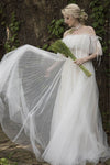 A-line Tulle Flowy Off the Shoulder Wedding Dress with a Brush/Sweep Train