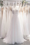 A-line Illusion Beaded Sleeveless Wedding Dress with a Brush/Sweep Train With a Bow(s)