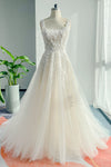 A-line Sleeveless Applique Beaded Wedding Dress with a Court Train