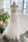 A-line V-neck Sleeveless Beaded Applique Wedding Dress with a Cathedral Train