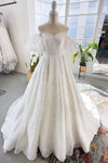 A-line Sweetheart Beaded Lace-Up Corset Waistline Puff Sleeves Sleeves Wedding Dress with a Chapel Train