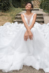 V-neck Sleeveless Tulle Beaded Applique Wedding Dress with a Chapel Train