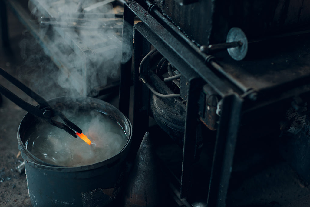 quenching a heat treated blade in oil