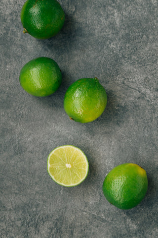 limes on gray background