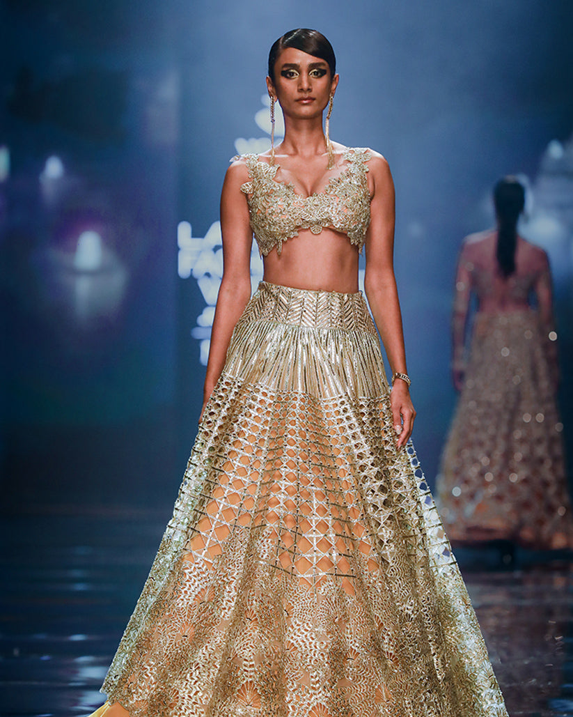 Disha Patani Slips Into Ivory Lehenga For Lakme Fashion Week