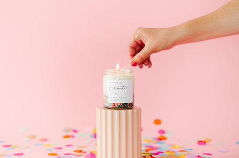 Cake candle with rainbow sprinkles