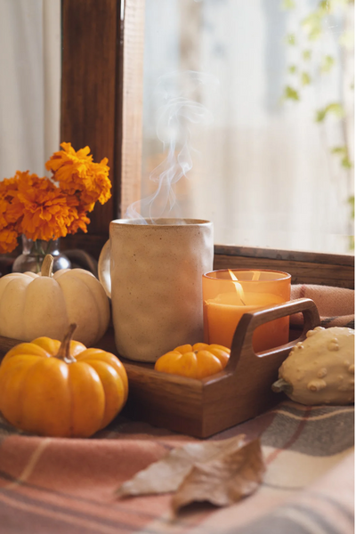 fall decorating with candles and pumpkins