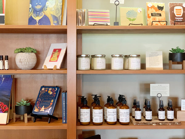 wholesale candles for resale in yoga studio with other local merchandise