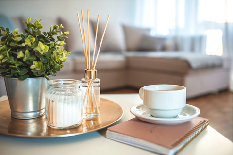 home fragrance with coffee cup in living room