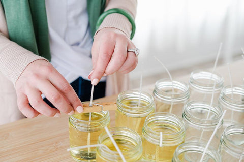 Hand pouring soy wax candles