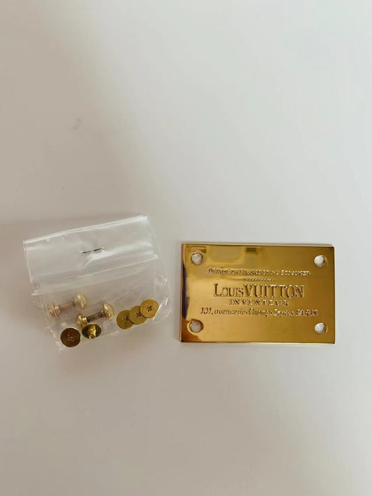 Lockit bag charm Louis Vuitton Gold in Metal - 33458079