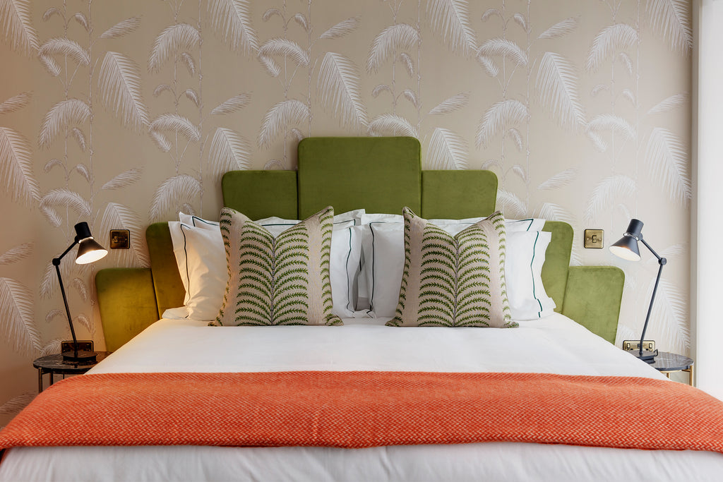 Hotel design with bed linen in a distinctive green stripe from The Fine Cotton Company