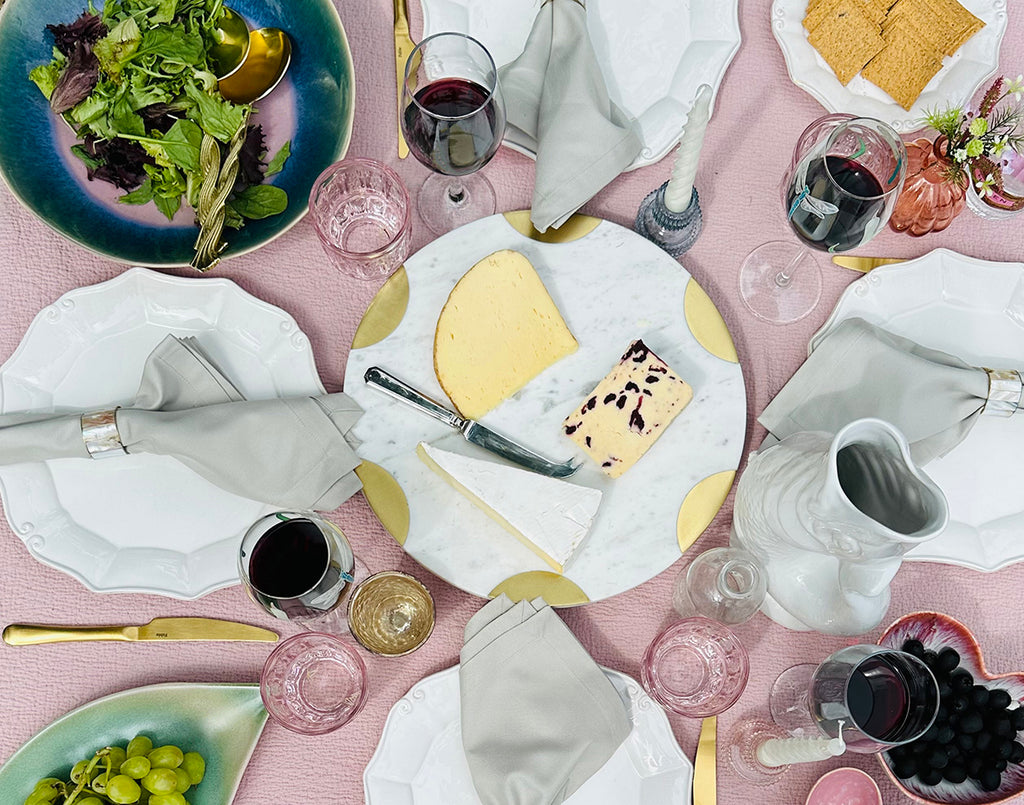 The Madison throw instantly sets the scene for sophisticated al fresco dining in this tablescape design for a cheese & wine party