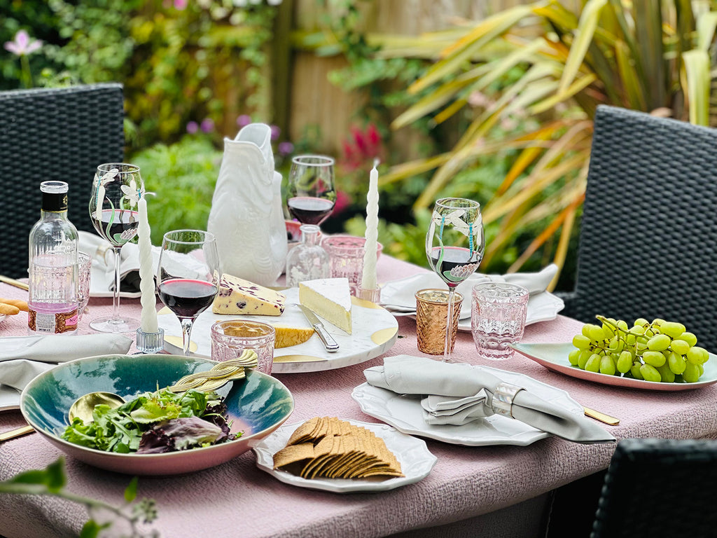 Subtle colour contrasts create an elegant scene for a cheese and wine al fresco dining party