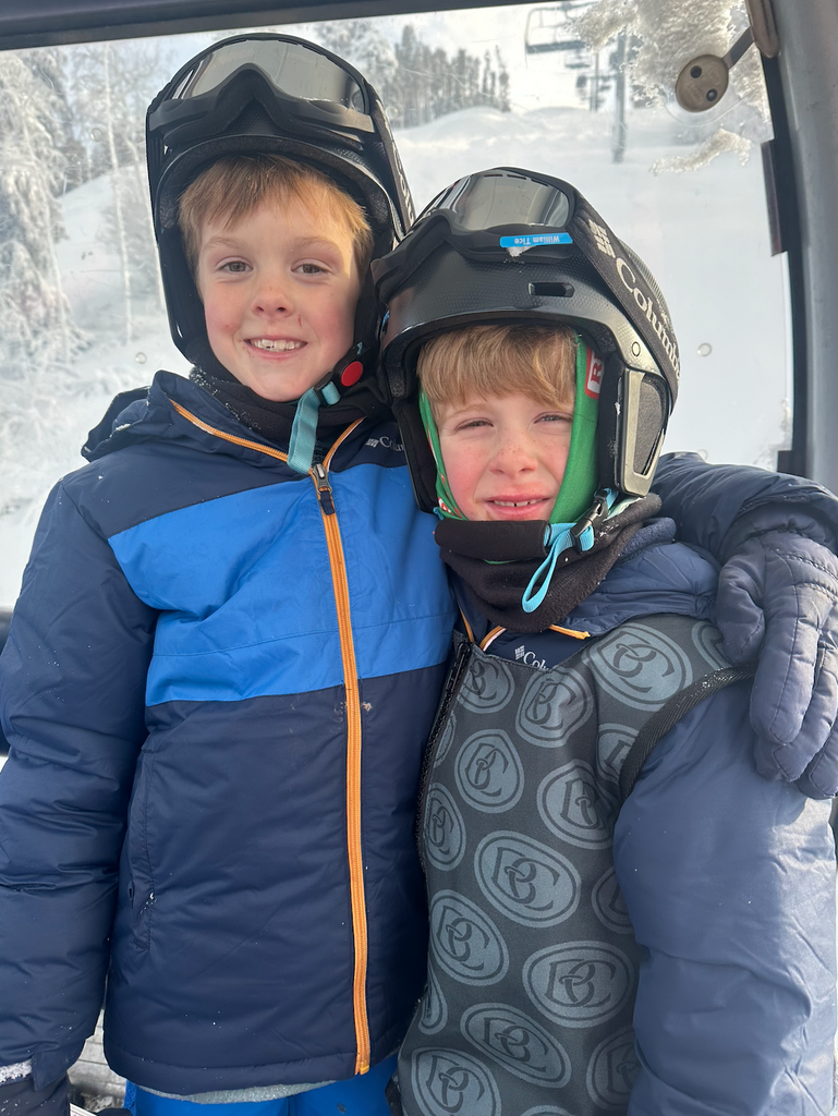 Two of Erin's 3 boys skiing