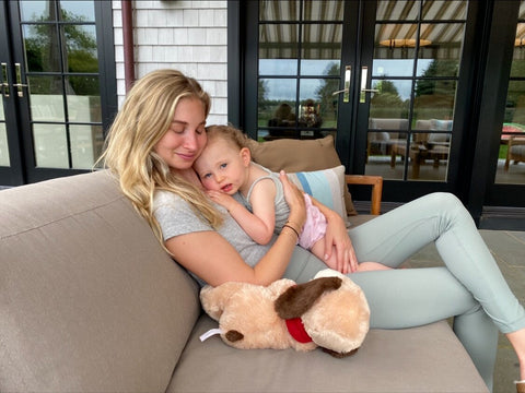 A picture of Laroot World dietitian and nutritionils Molly Knauer, formerly Molly Rieger, with her daughter