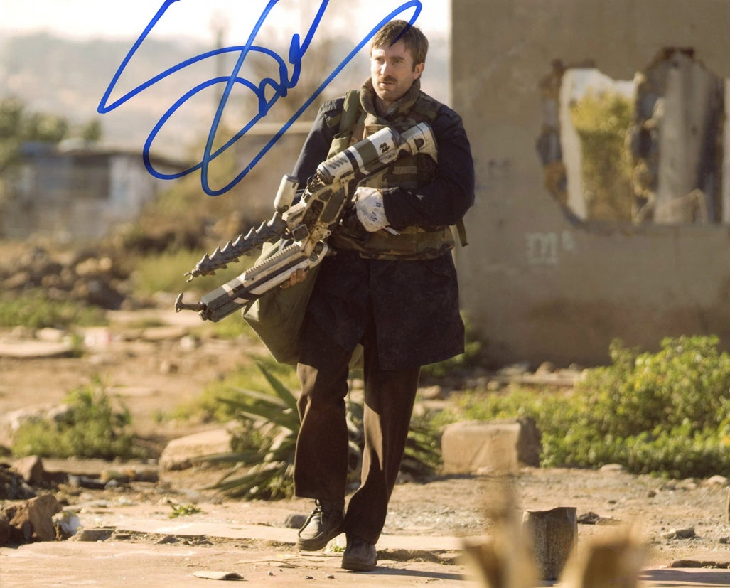 Sharlto Copley Signed Photo