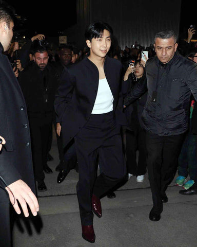 RM is seen wearing Bottega Veneta at the Incheon airport in Seoul