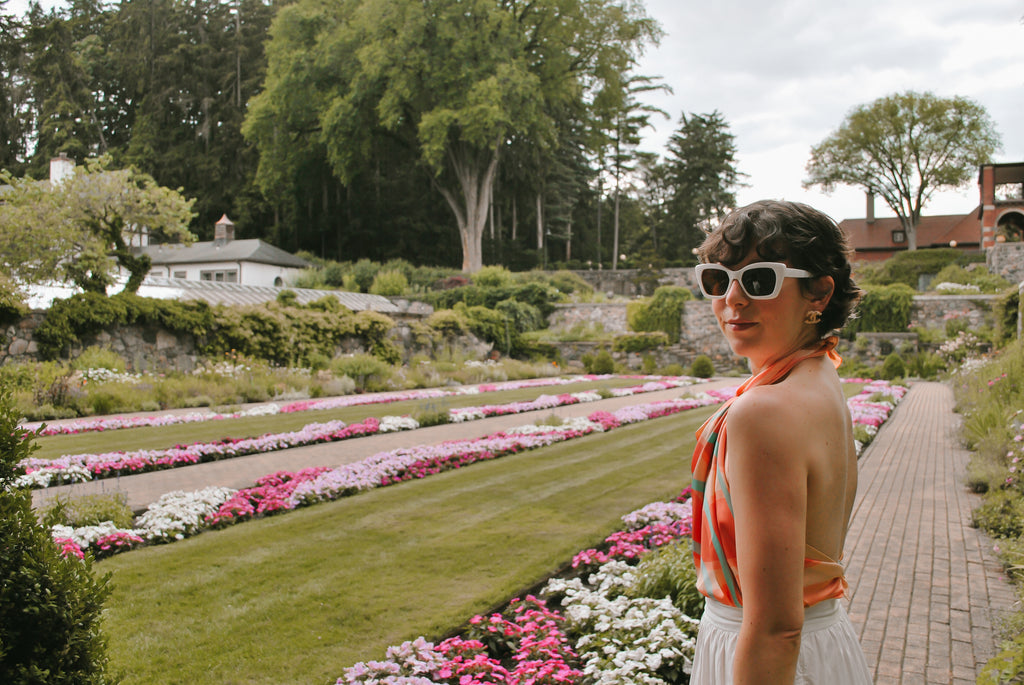 Fleur Sauvage founder, Maria Confer wearing the Soleil silk scarf as a knotted halter top