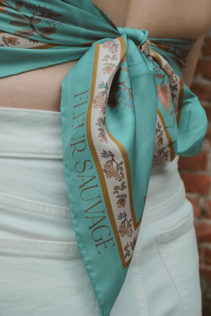 Fleur Sauvage J. Austen luxury silk scarf in the Lafayette Greens in Detroit, Michigan