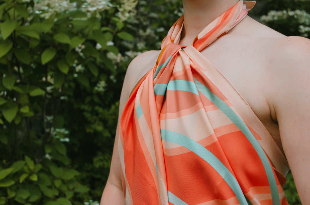 Fleur Sauvage founder, Maria Confer wearing the Soleil silk scarf as a knotted halter top
