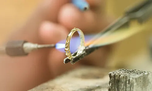 Gold ring being designed