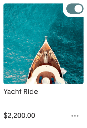 Top view of a yacht sailing on clear blue water, labeled 'Yacht Ride' costing $2,200.00.