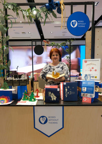 A vendor for Roses without Thorns stands at their booth in the RBC eXperience Market located in the Sherway Garden Mall 2022