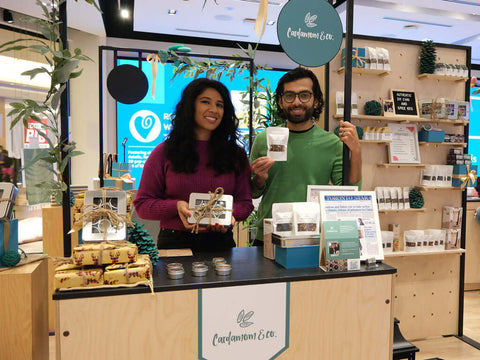 The founders of Cardamom and Co at their booth in the RBC eXperience Market located in the Sherway Garden Mall 2022