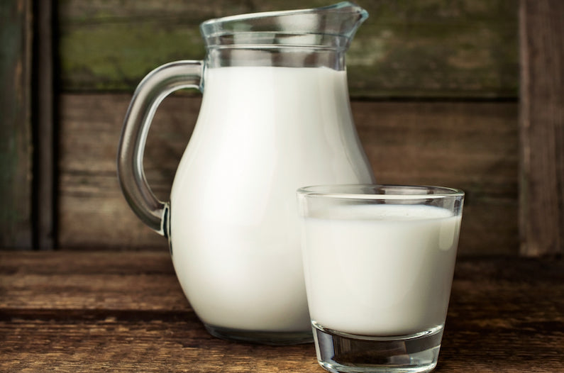 milk jug and a glass of milk