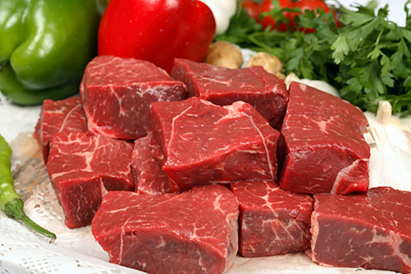 Cut up cubes of raw lean beef