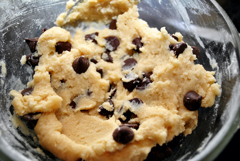 Protein cookie dough in a glass bowl