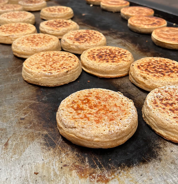 crumpets on stainless steel bbq plate
