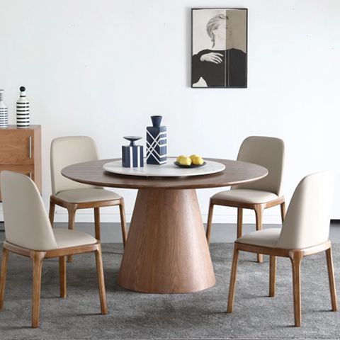 a round shape dining table with one solid wood top and base